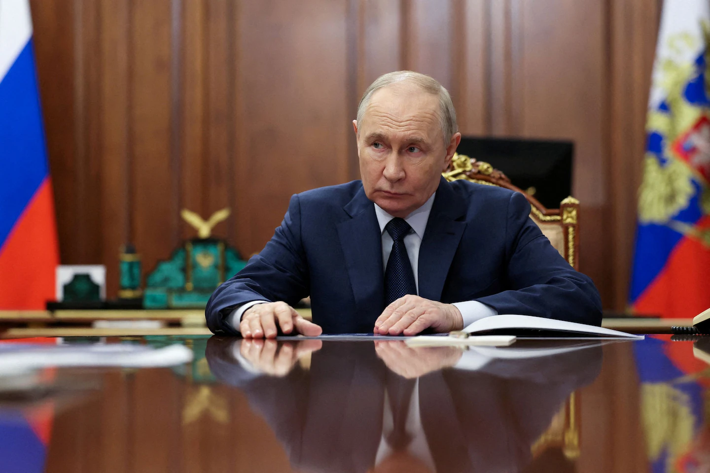 Путін
