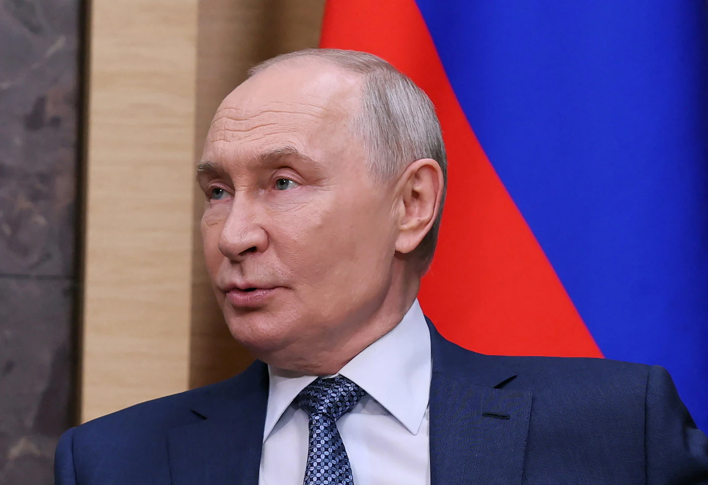 путін
